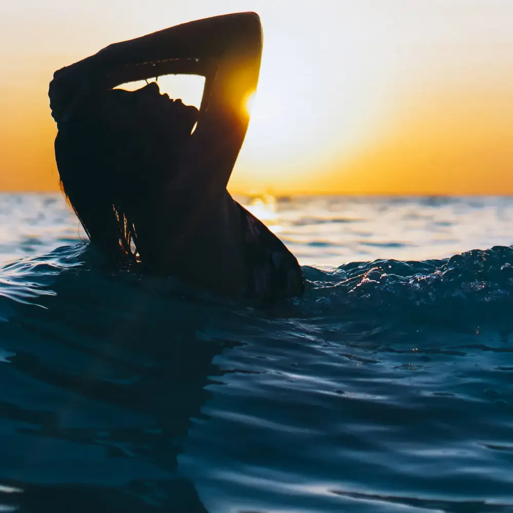 swimming sunset sea sicily luxury experience