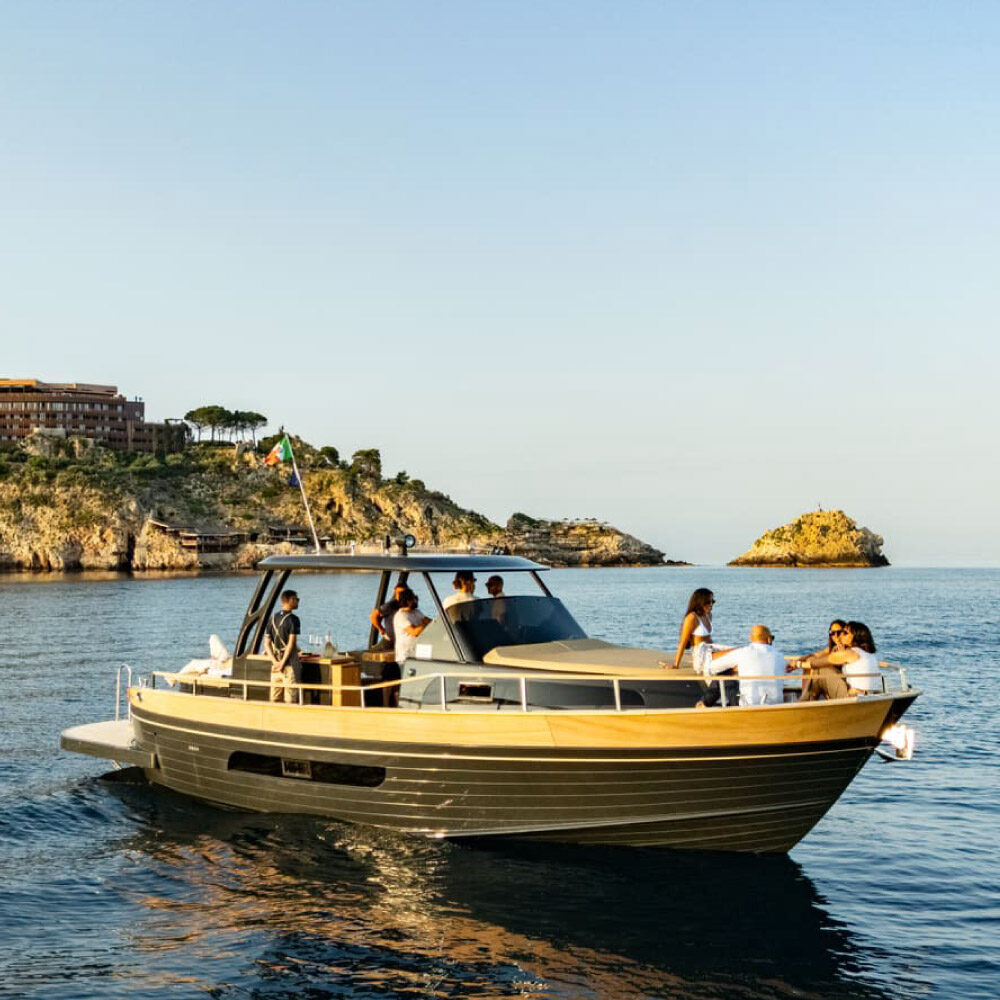 private yacht boarding taormina sunset